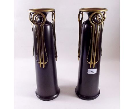 A pair of Art Deco brass and enamel large candlesticks - 38cm high 
