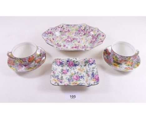 A pair of chintz cups and saucers and two James Kent chintz dishes 
