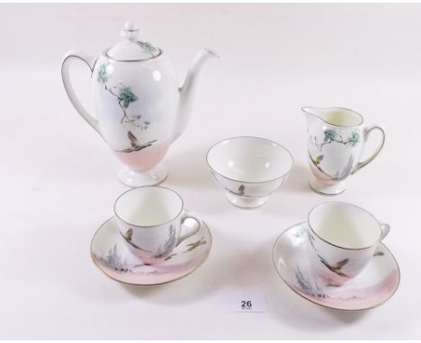 A Royal Doulton coffee set 'The Coppice' comprising: coffee pot, jug, bowl and six cups and saucers 