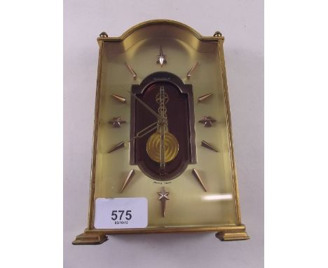 A Jaeger le Coultre brass cased mantel clock with jeweled visible escapement 