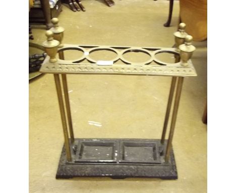 A brass and cast iron stick stand 