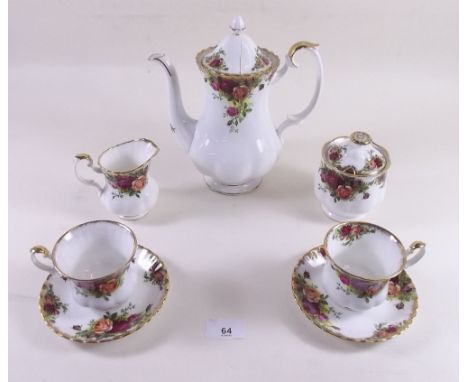 A Royal Albert Country Roses coffee set comprising: coffee pot (lid a/f), eight cups and saucers, open and covered sugars and