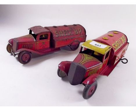 A Wells tin plate clockwork 'Shell BP' petrol tanker - good condition and another in poor condition 