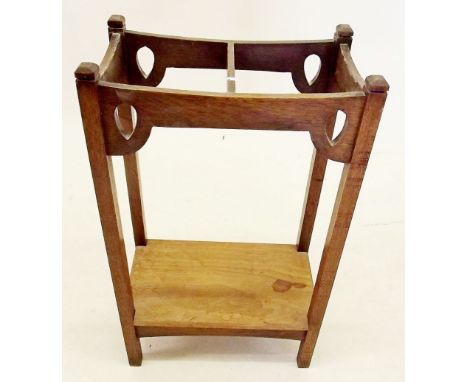 An Edwardian oak stick stand 