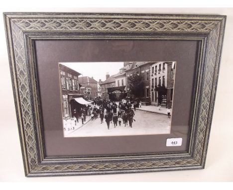 A framed print of Masonic procession in Newent 