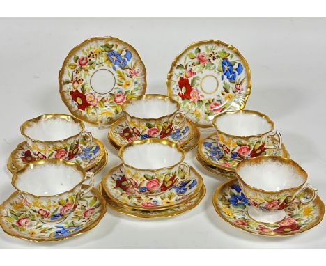 A Hammersley china eighteen piece part teaset including six side plates, five scalloped edge teacups and one tea cup on stemm
