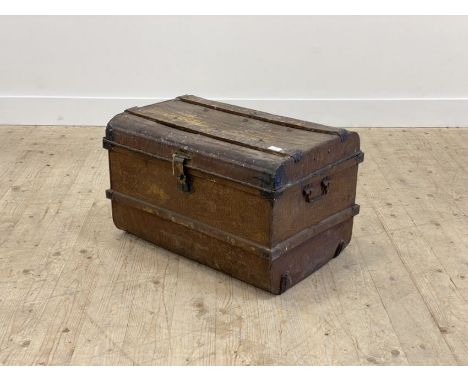 An early 20th century scumbled dome top tin travelling trunk, H42cm, W68cm, D49cm