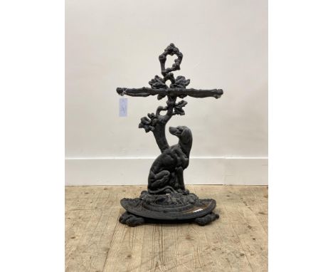 A Victorian style cast iron two division stick stand, formed as  a seated Labrador H70cm
