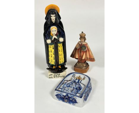 A pottery moulded Quimper figure, Ste. Anne des Bretons, complete with Child and Anchor, signed internally HB no.902 (20cm x 