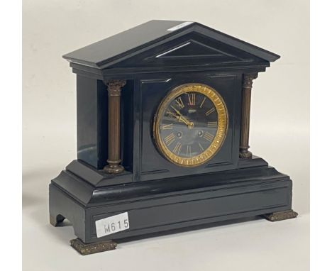 A Victorian slate mantel clock of architectural form, the case with cast columns and bracket supports, gilt dial with Roman c