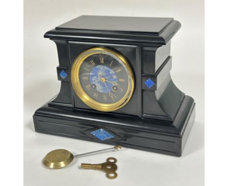 A Victorian black slate mantel clock, the moulded rectangular top above a lapis inlaid circular black enamelled and gilt meta