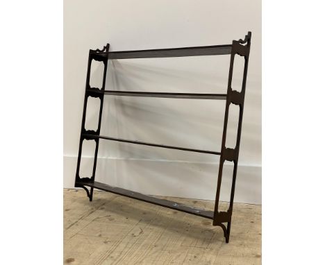 An early 20th century mahogany four height open wall hanging shelf with pierced panel end supports H62cm W62cm, D10cm