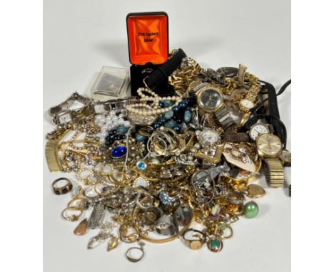 A collection of costume jewellery including paste pearls, bracelets, silver earrings, pendants, paste set wristwatches, a gen