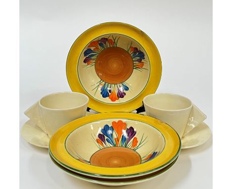 Clarice Cliff for Wilkinson Ltd, three 'Bizarre' 'Crocus' pattern bowls in yellow/orange/green (marked verso) (w- 16cm) (a/f)