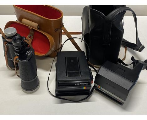 Two vintage Polaroid cameras and a pair of Zenith 10x50 binoculars 