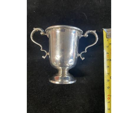 A small hallmarked silver trophy 68.72 grams. 