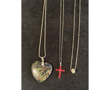 Three 925 silver chains and pendants 