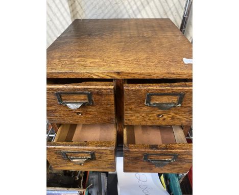 A oak four drawer index filing cabinet made by Globe Wernicke 43x41x29cm, shipping unavailable 