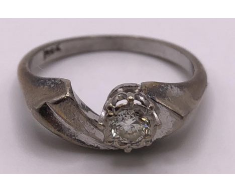 An 18ct white gold and solitaire diamond ring, ring size NWeight: 4.5 g all in 