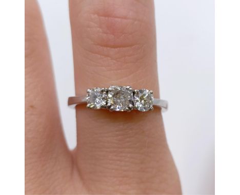 A lab grown diamond three stone ring, central stone 0.5ctRing size M, with 'Electronic Copy' of certificate 