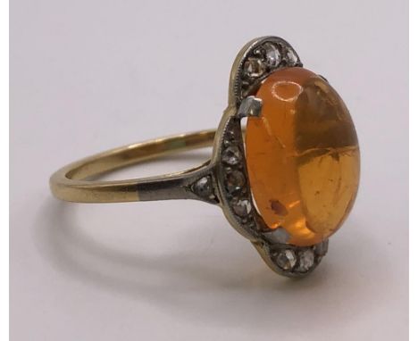 An Art Deco 18ct gold and fire opal ring, ring size N 