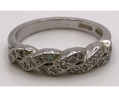 A platinum and diamond ring, ring size L, 5.1 g all in 