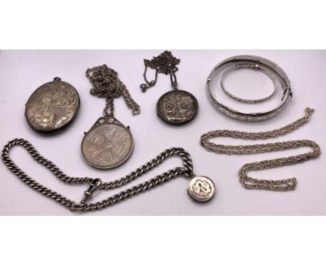 A silver bracelet, with attached locket, two lockets, a silver bangle, other silver and silver coloured metal jewellery (7) 