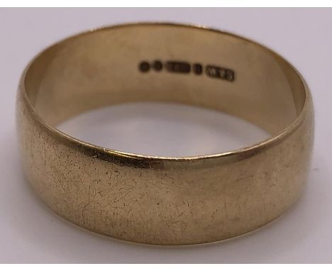 A 9ct gold wedding band, ring size X, 4.8 g 