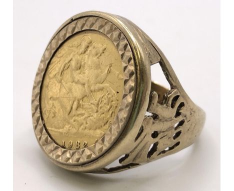 A 9ct gold, and half sovereign signet ring, 1982all in 85 g 