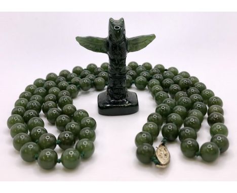 A jade bead necklace, and a jade carved totem pole, (2) 