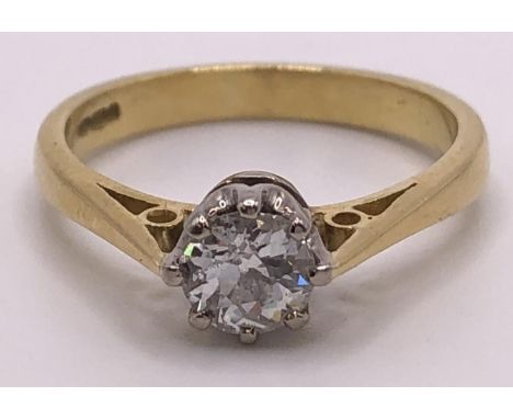 An 18ct gold and diamond solitaire ring, ring size M 