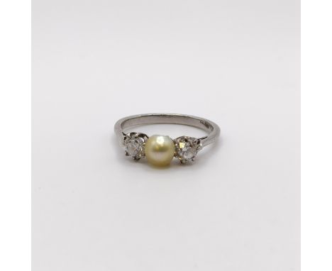 An 18ct white gold, diamond and cultured pearl ring, ring size NDiamonds 0.2ct approx. eachthere are faults and inclusions to