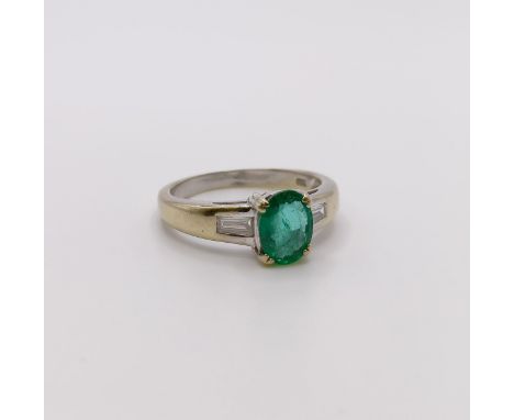 An 18ct gold, emerald and diamond ring, ring size L 