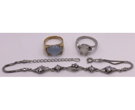 A Sarah Cov dress ring, a silver and opal dress ring, and a bracelet (3) 