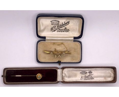 A 9ct gold and turquoise stick pin, in a vintage jewellery box, and a 9ct gold and seed pearl bar brooch, in a vintage jewell