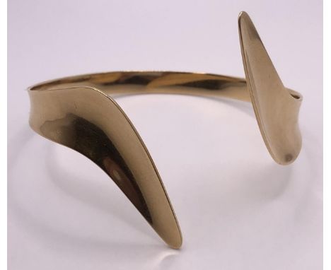 A 14ct gold bangle, 18.3 g 
