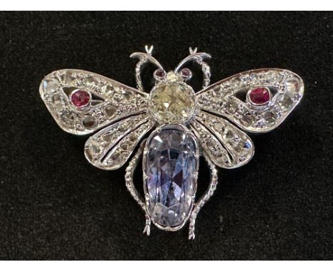 A diamond, aquamarine and ruby bee brooch, the central diamond 1.2ct approx.Aquamarine untested 6.9 x 7.3 mm approx Central d