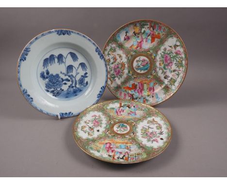 A Canton enamel plate with figured panels, 9" dia, a larger similar plate, 9 1/2" dia, and a Chinese blue and white tree deco