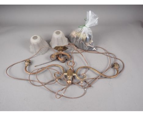 A coppered brass two-light rise and fall ceiling pendant 