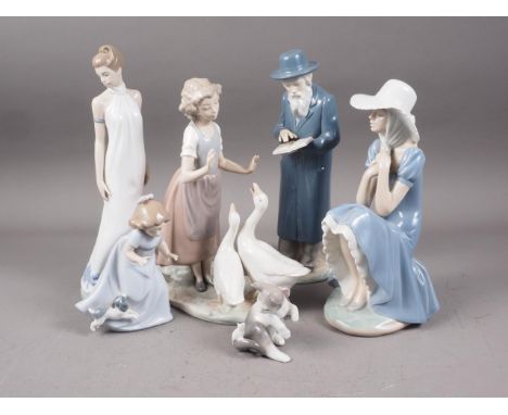 A Nao figure of a girl and two geese, 11" high, four other Nao figures and a Lladro figure of a kitten and a mouse 