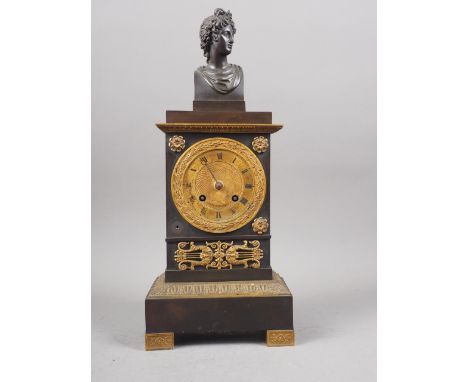 An Empire style mantel clock with gilt brass Apollo's head finial, gilt dial by Anglesa Marseille, 15" high 