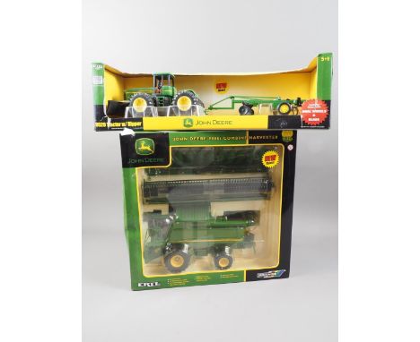 A Britains die-cast and plastic John Deere 9520 Tractor with Ripper and a John Deere 9880i Combine Harvester, both boxed 