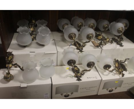 A QUANTITY OF BRASS LIGHT FITTINGS AND SHADES - SEVEN DOUBLES AND FOUR SINGLES