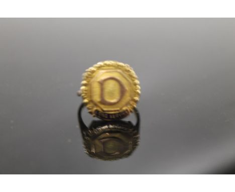 A 9CT GOLD LONG SERVICE RING (D FOR DUNLOP?)