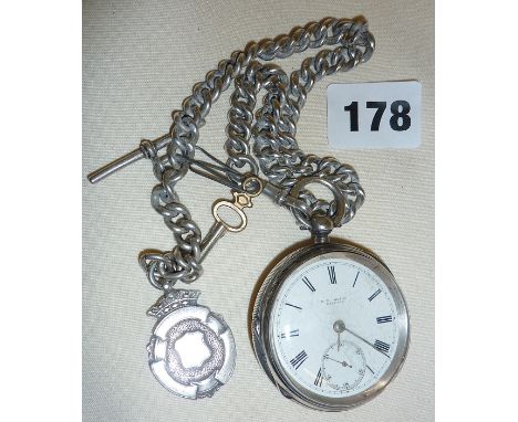 Victorian silver pocket watch with fob chain and attached medal. Face marked as W.H. Mason Clifton - working