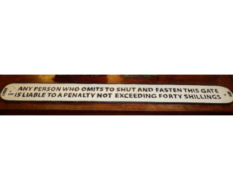 Modern LNER cast iron railway sign reading "Any person who omits to shut and fasten this gate is liable to a penalty not exce