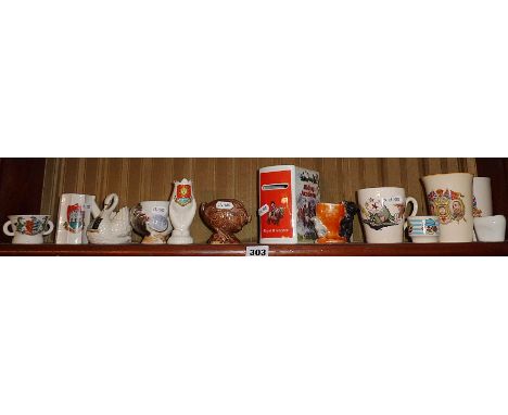 A Royal Worcester Thelwell's Riding Academy money box, novelty egg cups, a Beswick "Haggis", a Tom &amp; Jerry mug and creste