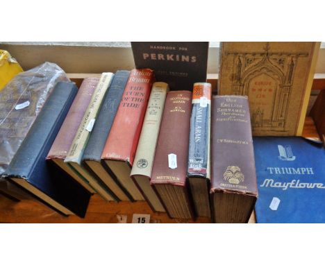 Shelf of books, including Debretts Peerage 1899, handbooks for Triumph Mayflower, Morris Minor and Perkins Diesel Engines, et