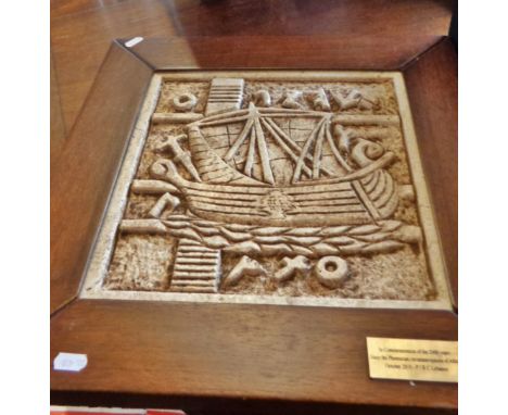 Wood framed ceramic relief plaque of a Phoenician sailing vessel commemorating the circumnavigation of Africa