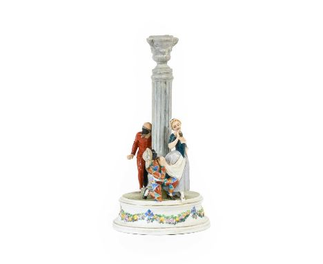 A Cozzi Porcelain Comedia del Arte Candlestick Group, circa 1780, modelled as Harlequin wooing Columbine whilst Pantalone wat